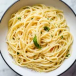 Delicious Garlic Butter Pasta topped with parsley, garnished beautifully.