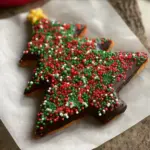 Christmas Tree Rainbow Cookie Cake decorated with vibrant layers and festive design