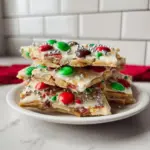 Delicious White Chocolate Christmas Crack dessert on a festive plate