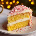 Delicious Peppermint Candy Cane Cake decorated with festive candy canes and icing