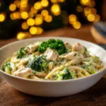 Creamy Keto Chicken Alfredo with Broccoli in a bowl garnished with parsley