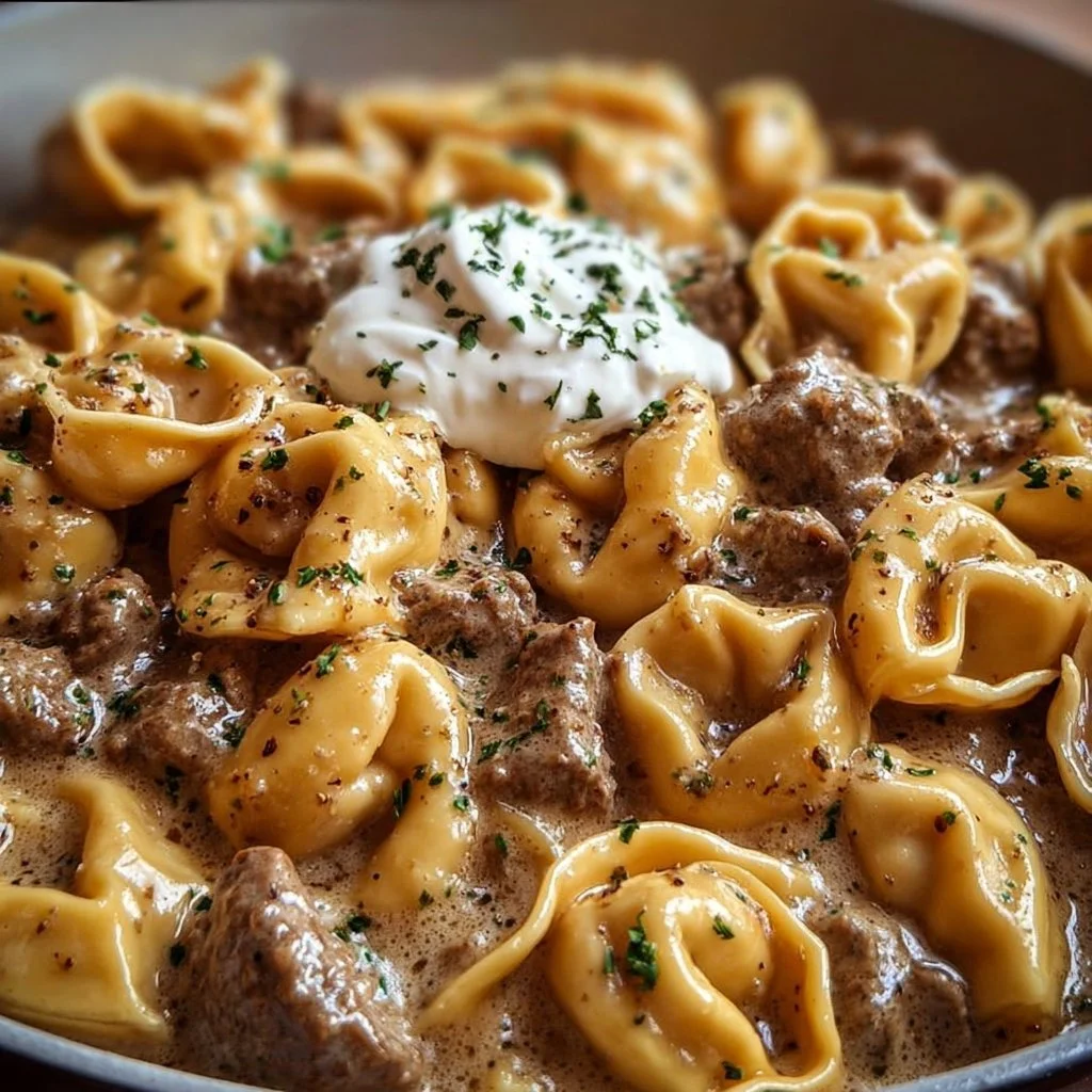 Creamy skillet beef stroganoff served in a skillet with mushrooms and noodles
