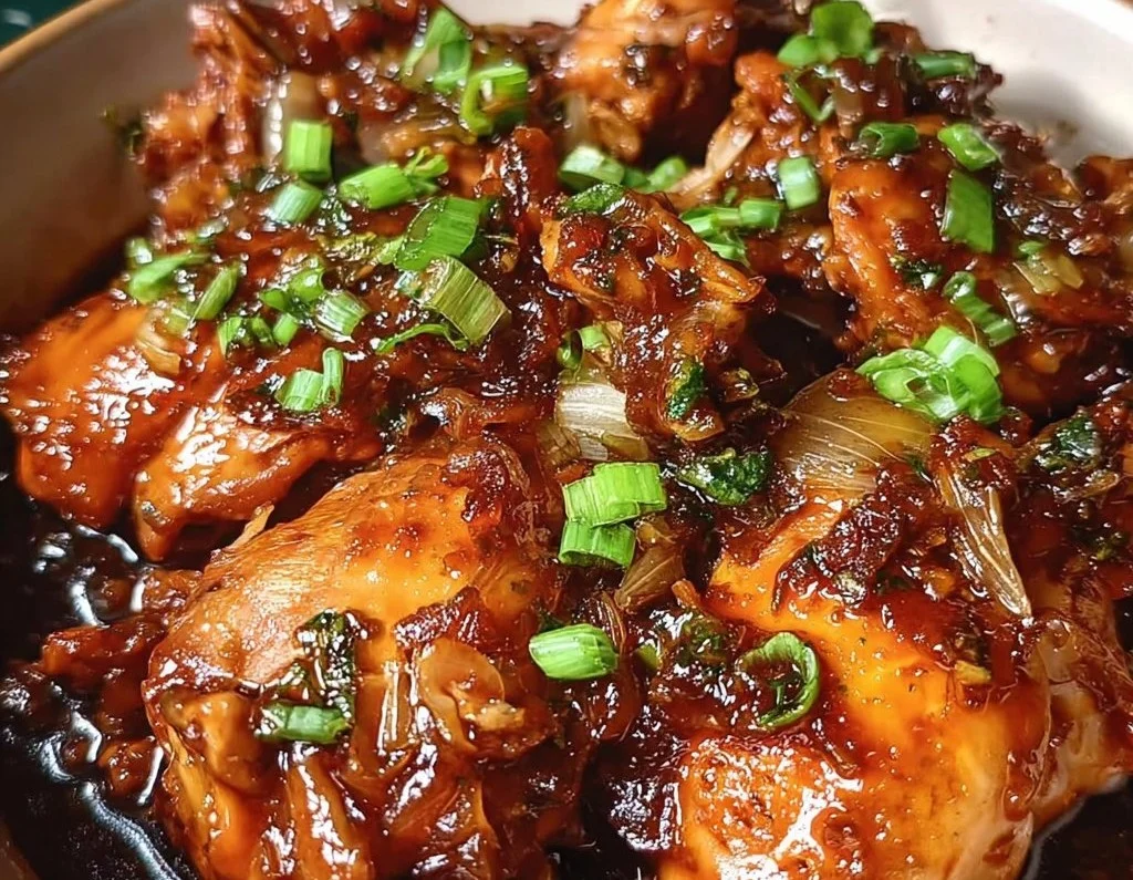 Delicious slow cooker honey garlic chicken served with rice and vegetables.