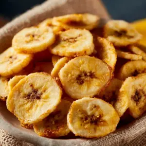 Crispy homemade air fryer banana chips in a bowl