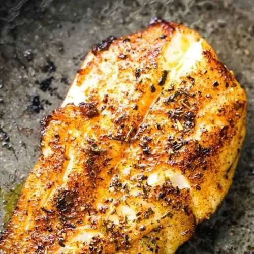 Plate of blackened Orange Roughy with seasoned spices