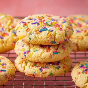 Yellow cake mix cookies topped with colorful sprinkles