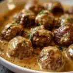 Delicious Swedish meatballs served with creamy sauce on a plate