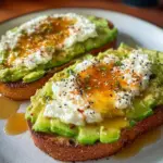 Delicious cottage cheese avocado toast topped with fresh herbs and spices
