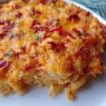 Pimento cheese hash brown casserole baked to perfection with creamy cheese