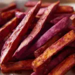 Delicious purple sweet potato fries served on a plate