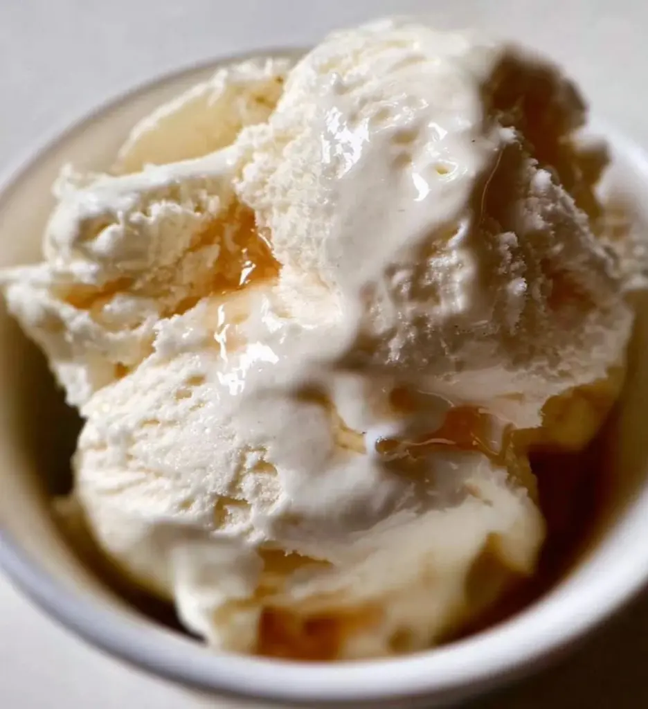Cottage cheese ice cream with brown butter and vanilla in a bowl