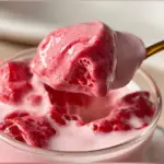 Delicious fresh raspberry cloud mousse topped with berries and mint.