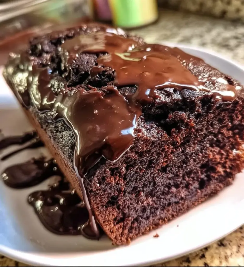 Slice of hot fudge brownie bread with rich chocolaty texture