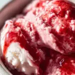 Delicious strawberry cottage cheese ice cream served in a bowl